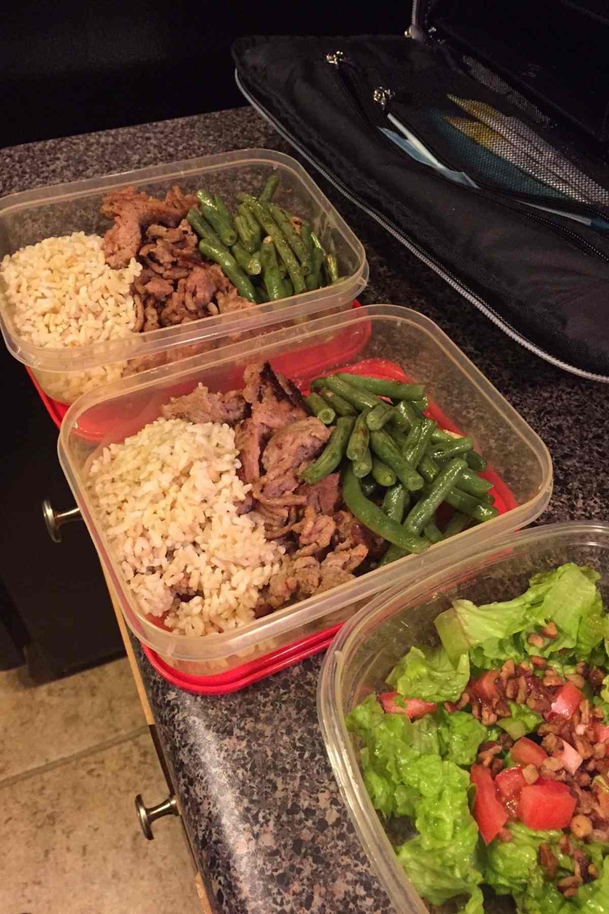 post workout meal of rice, protein and vegetables in plastic container