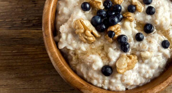 bowl of oatmeal with blueberries and walnut