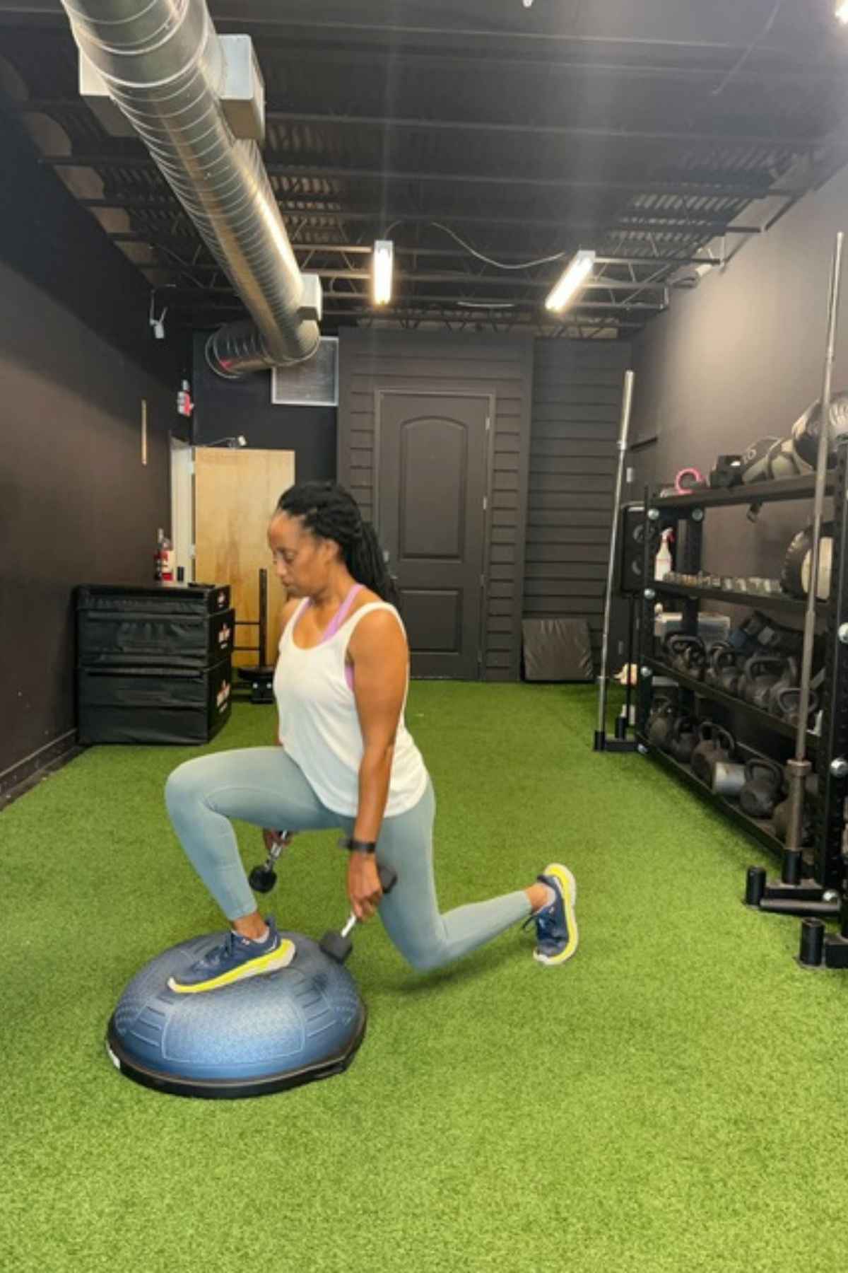 woman doing bosu leg exercises lunges